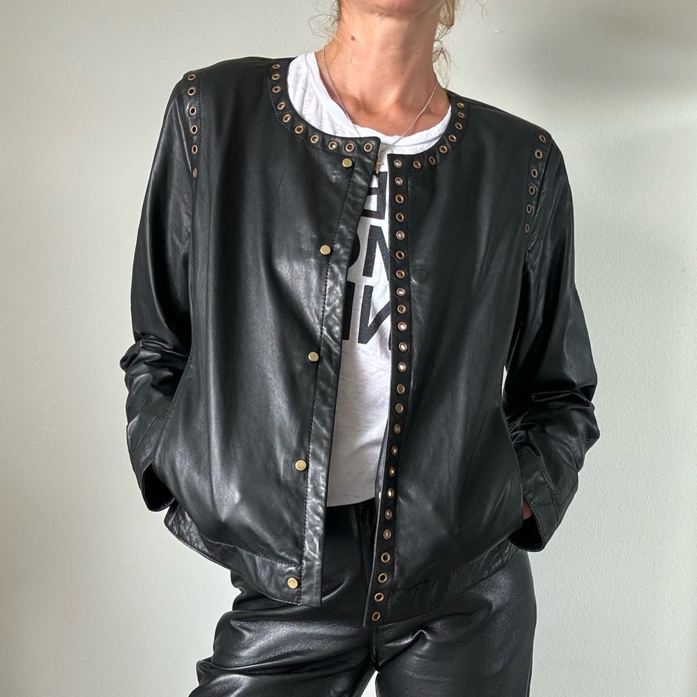 Donna Karan black genuine leather moto jacket, size M. Black label